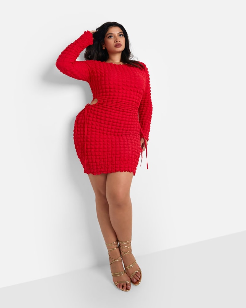 Front of a model wearing a size 3X Scorpio Popcorn Smocking Cut Out Mini Bodycon Dress - Red in Red by Rebdolls. | dia_product_style_image_id:328524
